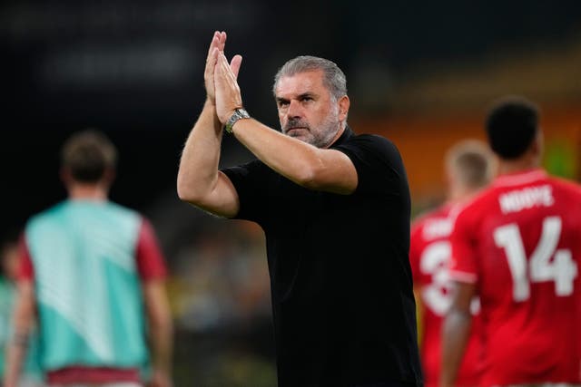 Ange Postecoglou applauds the travelling fans after a 2-2 draw at Real Betis (Jose Breton/AP)