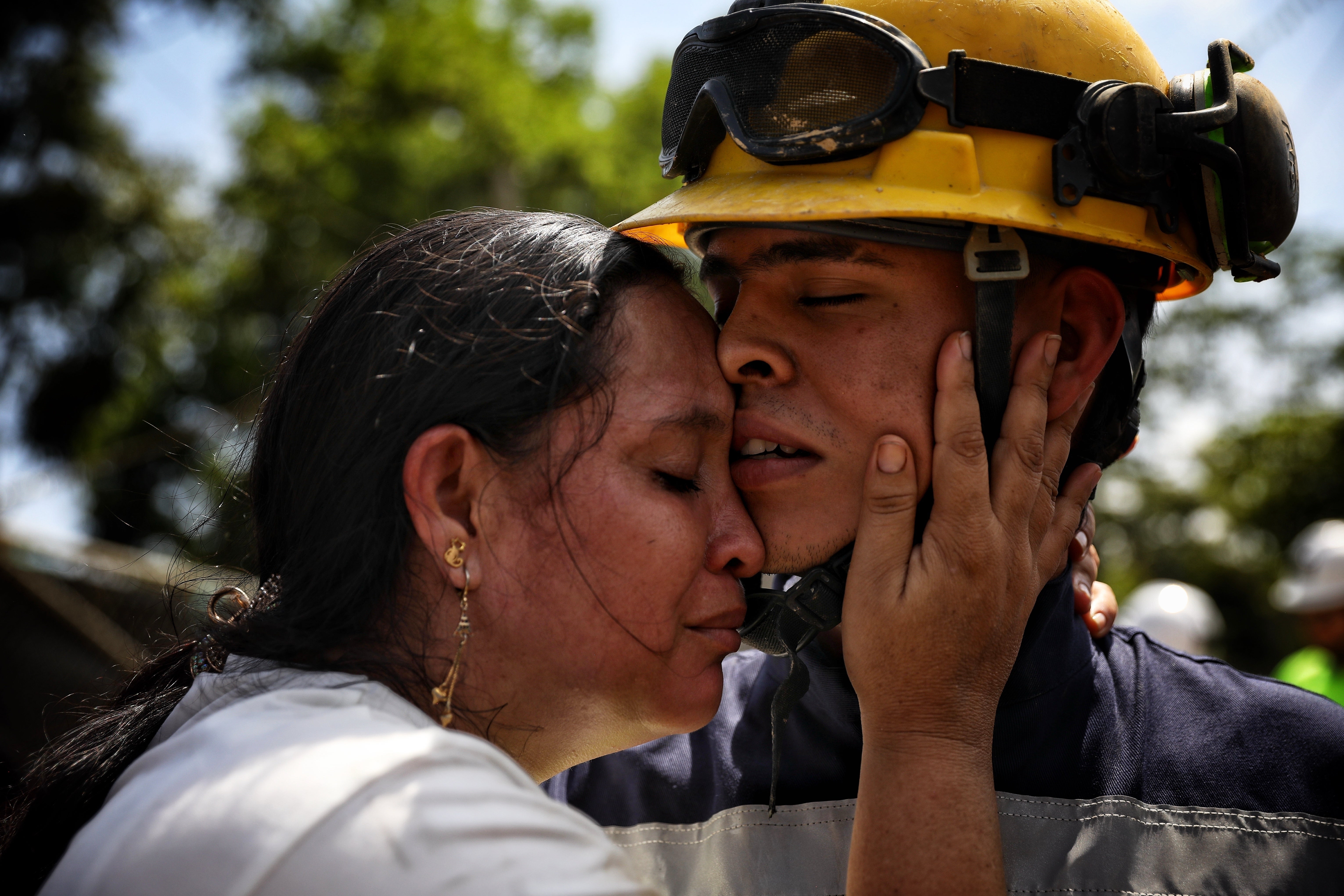 <p>Yuliana Andrea Agudelo embraces her son Sebastian Agudelo after he was rescued from a gold mine that had collapsed trapping over 20 miners, in Segovia, Colombia</p>