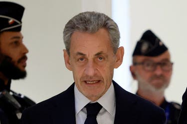 <p>Nicolas Sarkozy arrives at the courthouse in Paris on Thursday</p>