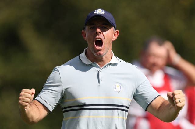 <p>Rory McIlroy celebrates after winning his opening match of the Ryder Cup with Tommy Fleetwood</p>