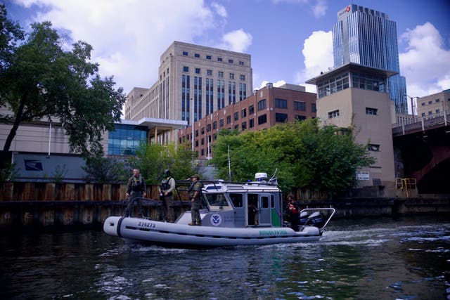 <p>Border Patrol agents armed with guns cruised the Chicago River on Thursday, part of ‘Operation Midway Blitz,’ which has netted over 500 arrests this month</p>