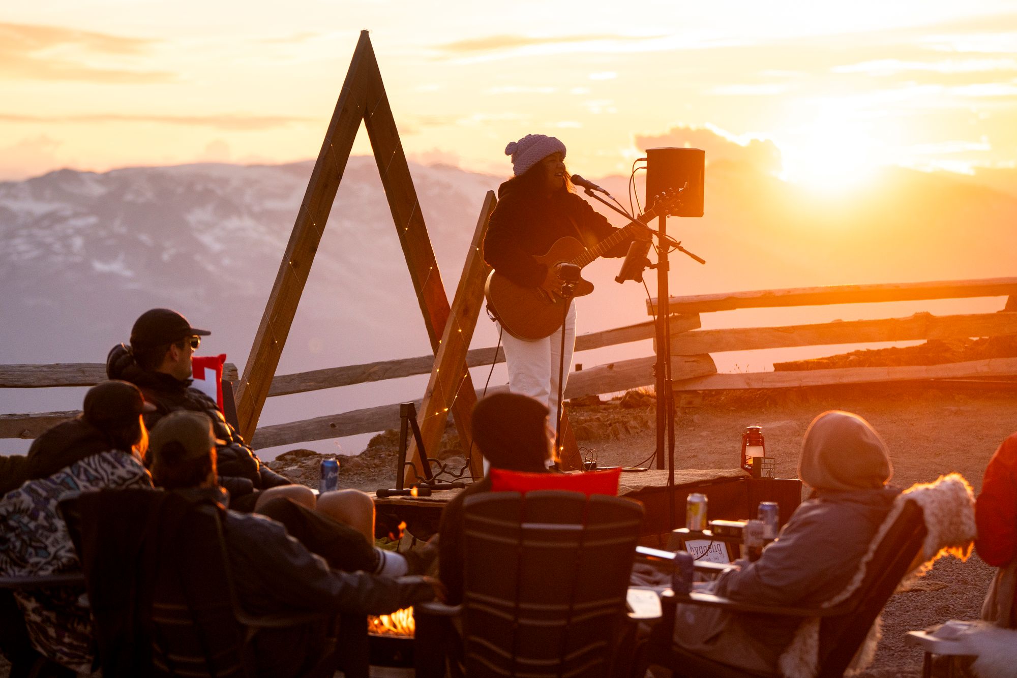 Jenna May performing at the top of the mountain