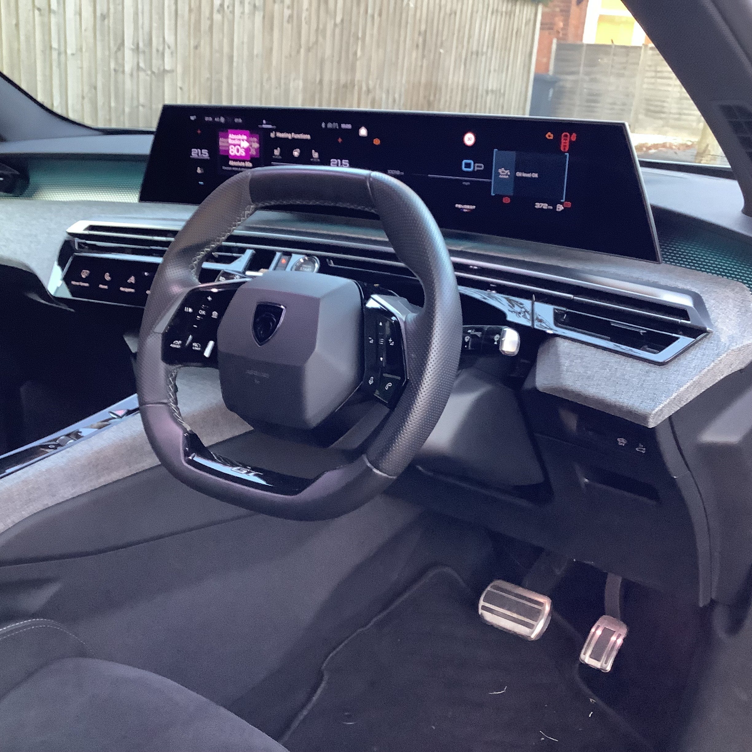The interior is what sells this car, with its curved 21-inch hi-definition digital screen