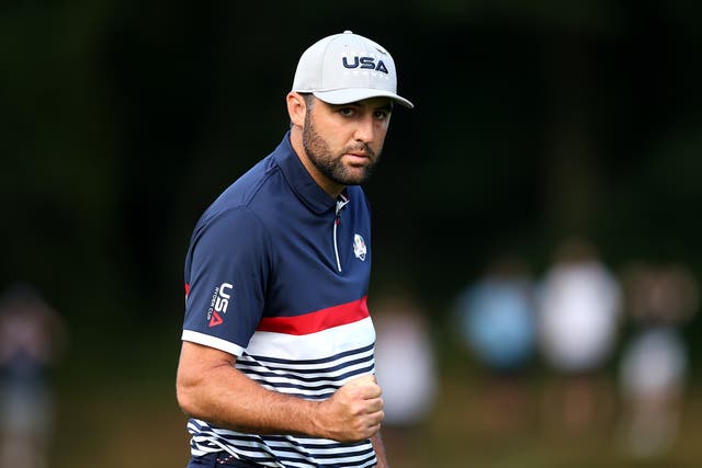 <p>Scottie Scheffler of Team United States reacts on the second green</p>