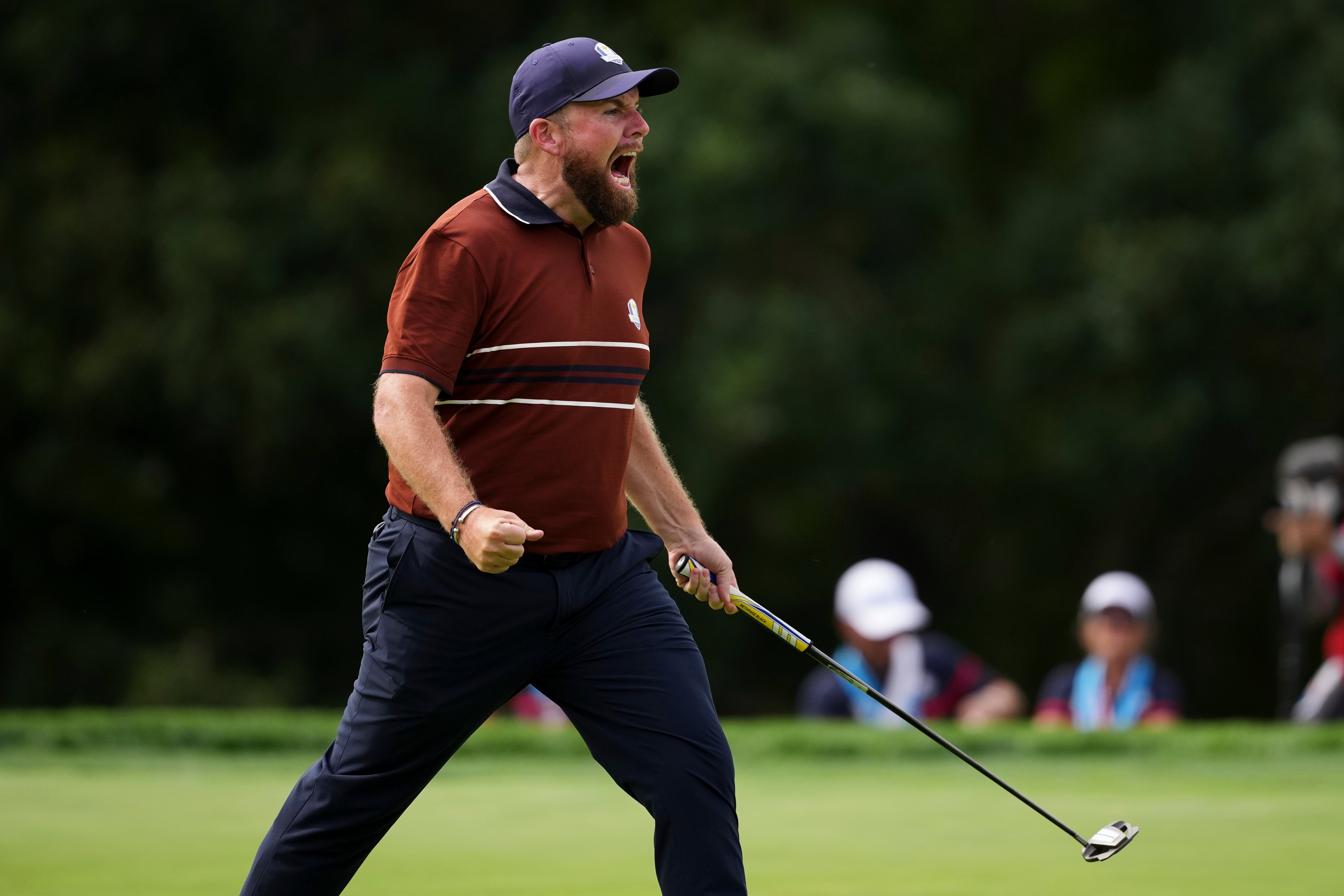 Europe's Shane Lowry celebrates after a putt on the fourth hole at Bethpage Black