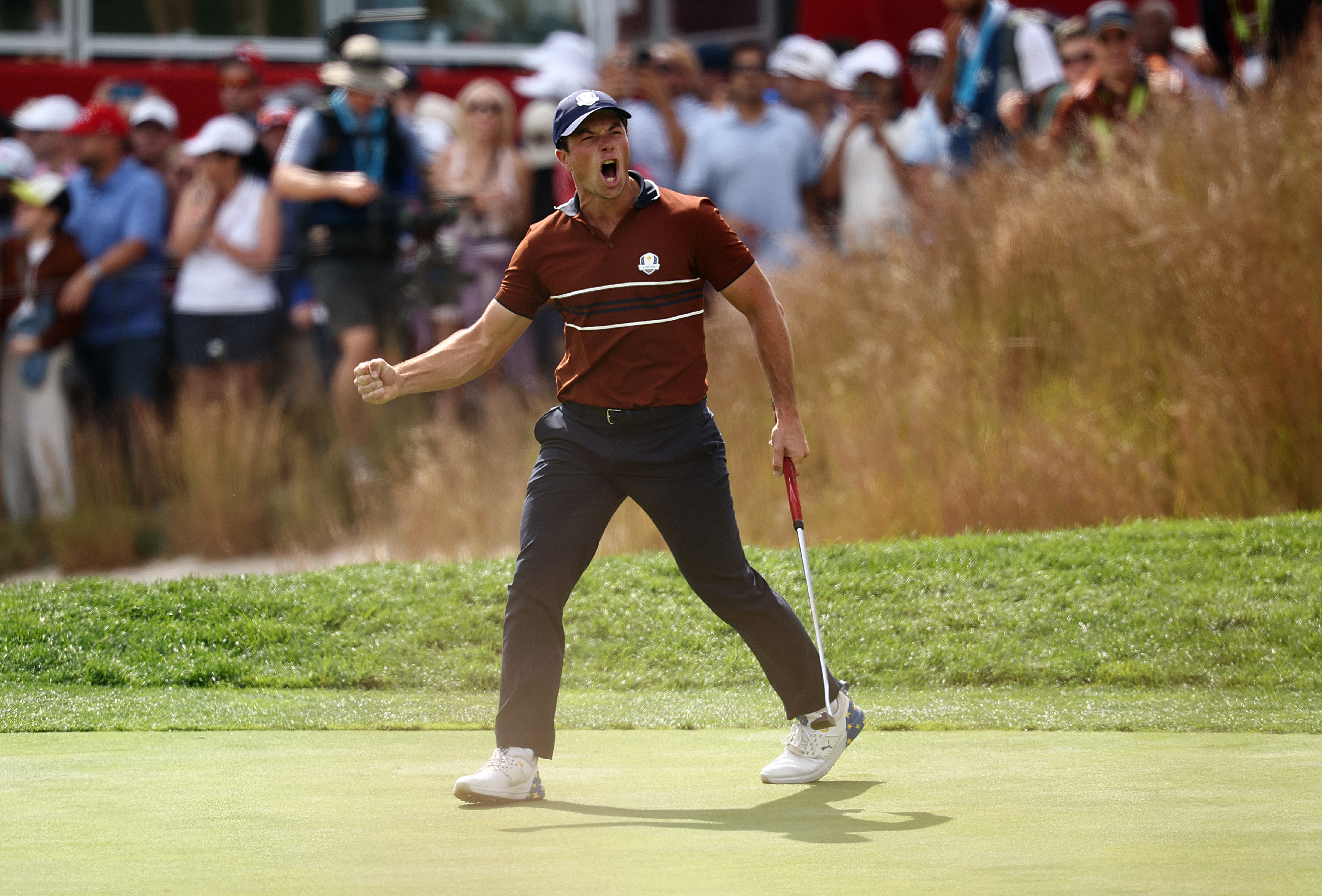 Viktor Hovland of Team Europe reacts on the 17th green during the Saturday morning foursomes