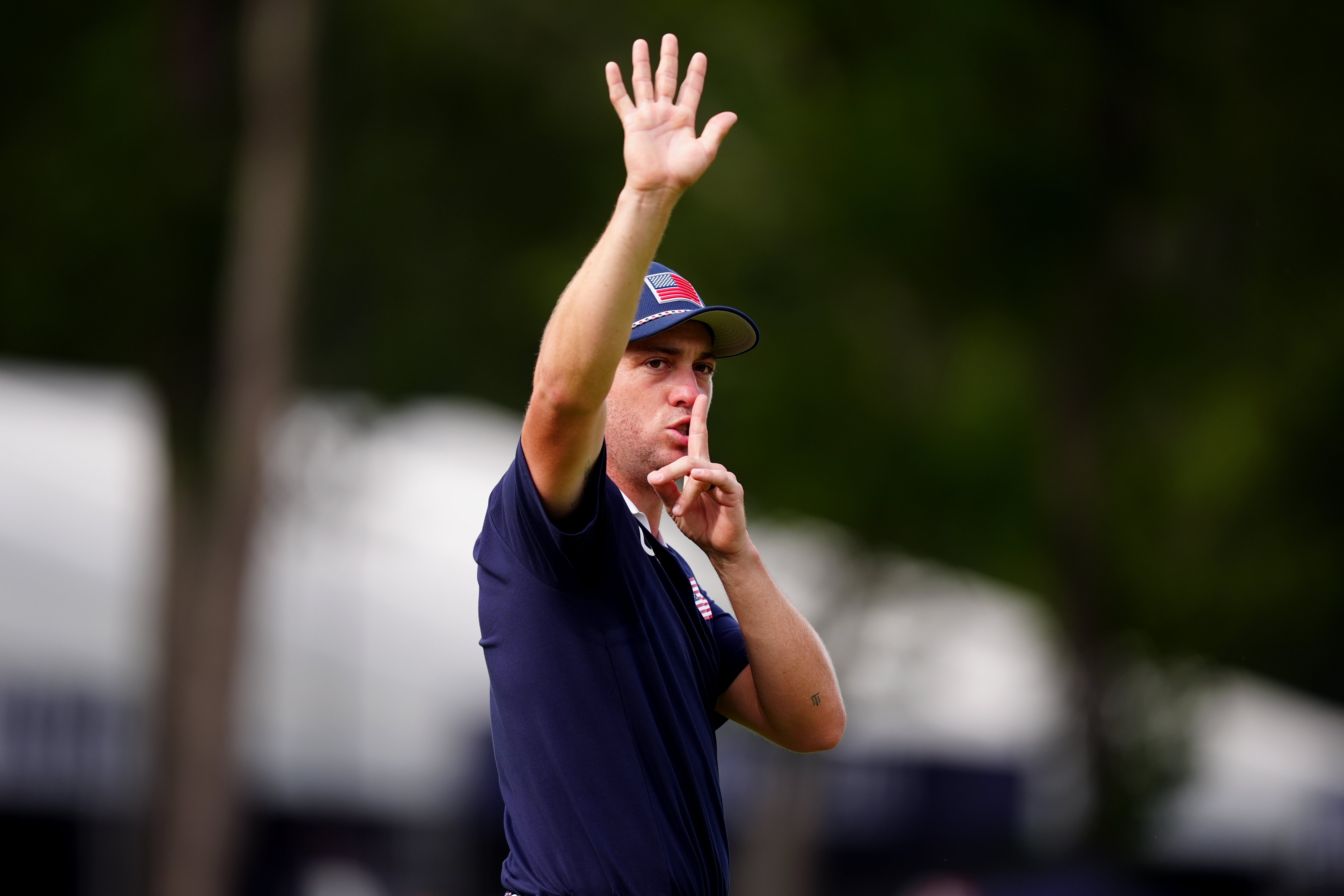 Justin Thomas called for calm as McIlroy prepared to play his shots (Mike Egerton/PA)