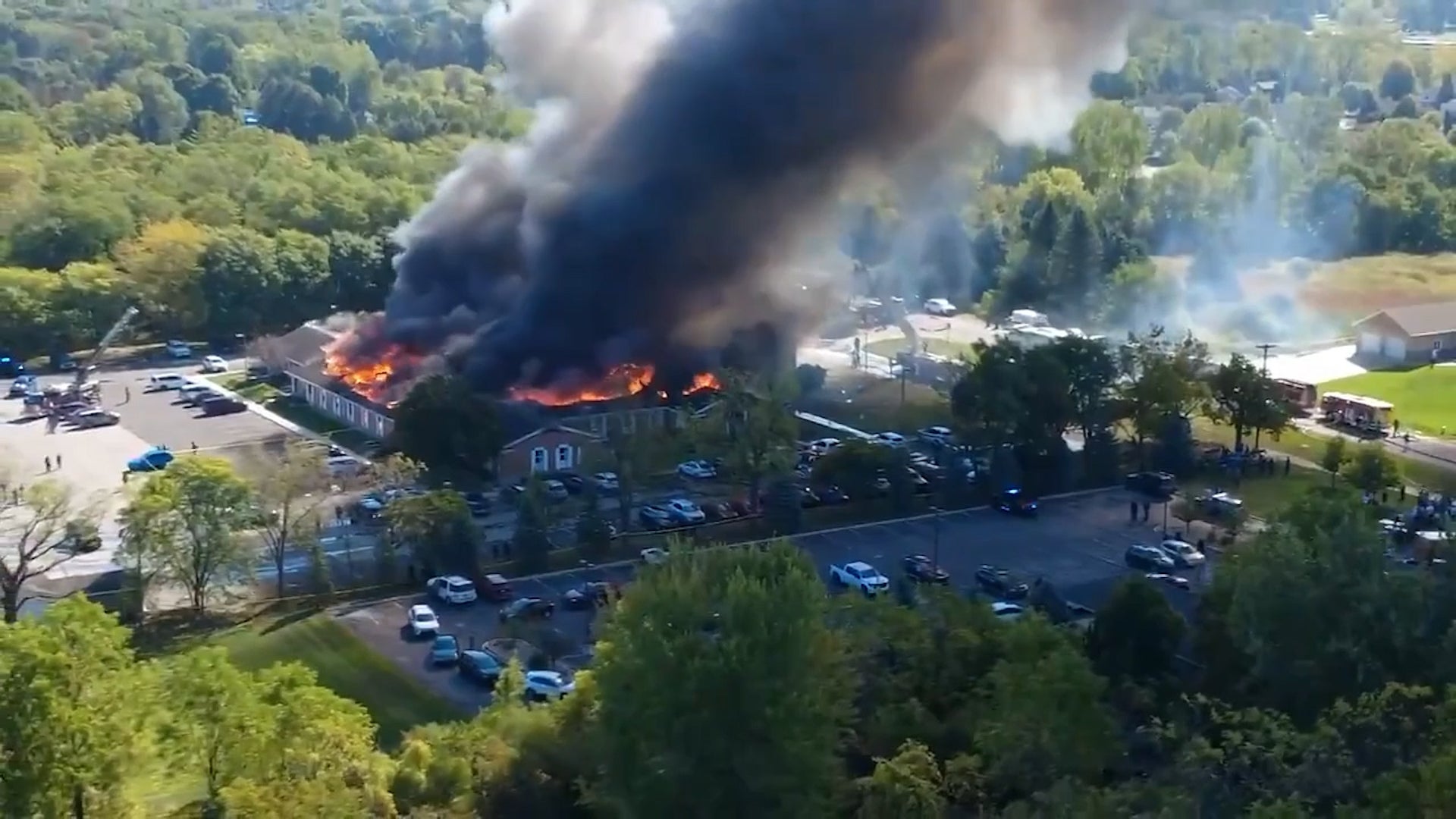 <p>Michigan mormon church burns after gunman rams car into building and opens fire</p>