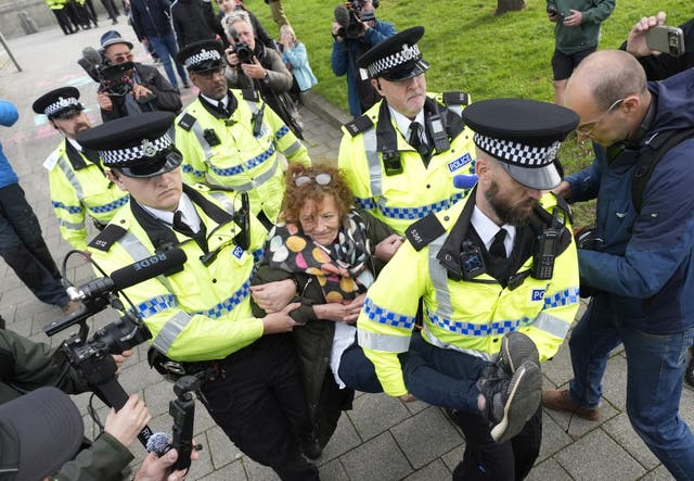 <p>A protester is carried away by police at a Palestine Action demonstration in Liverpool</p>