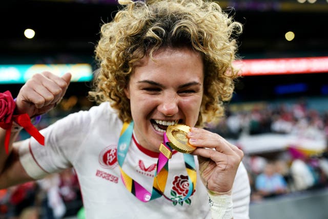 Ellie Kildunne bites her winners medal (Ben Whitley/PA)