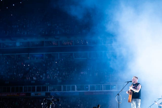 <p>Zach Bryan performing during his 'Quittin Time' tour in Nashville in June 2024</p>