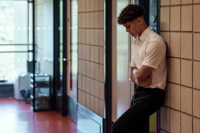 <p>Strict uniform and appearance codes require shirts to be tucked in and ties to be straight</p>