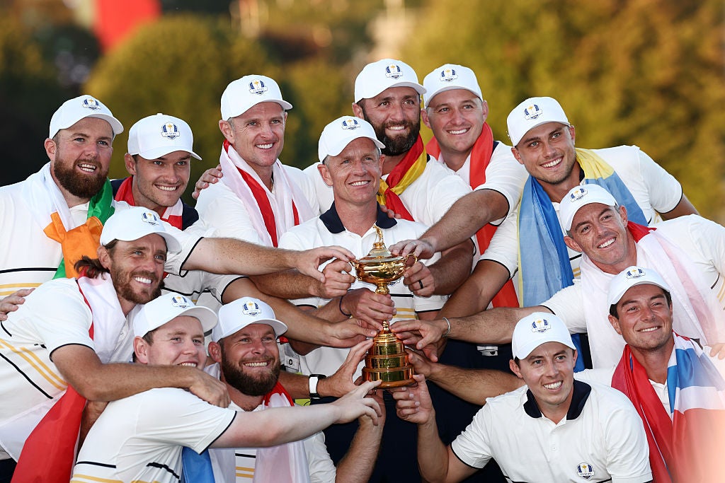 Team Europe celebrate with the trophy
