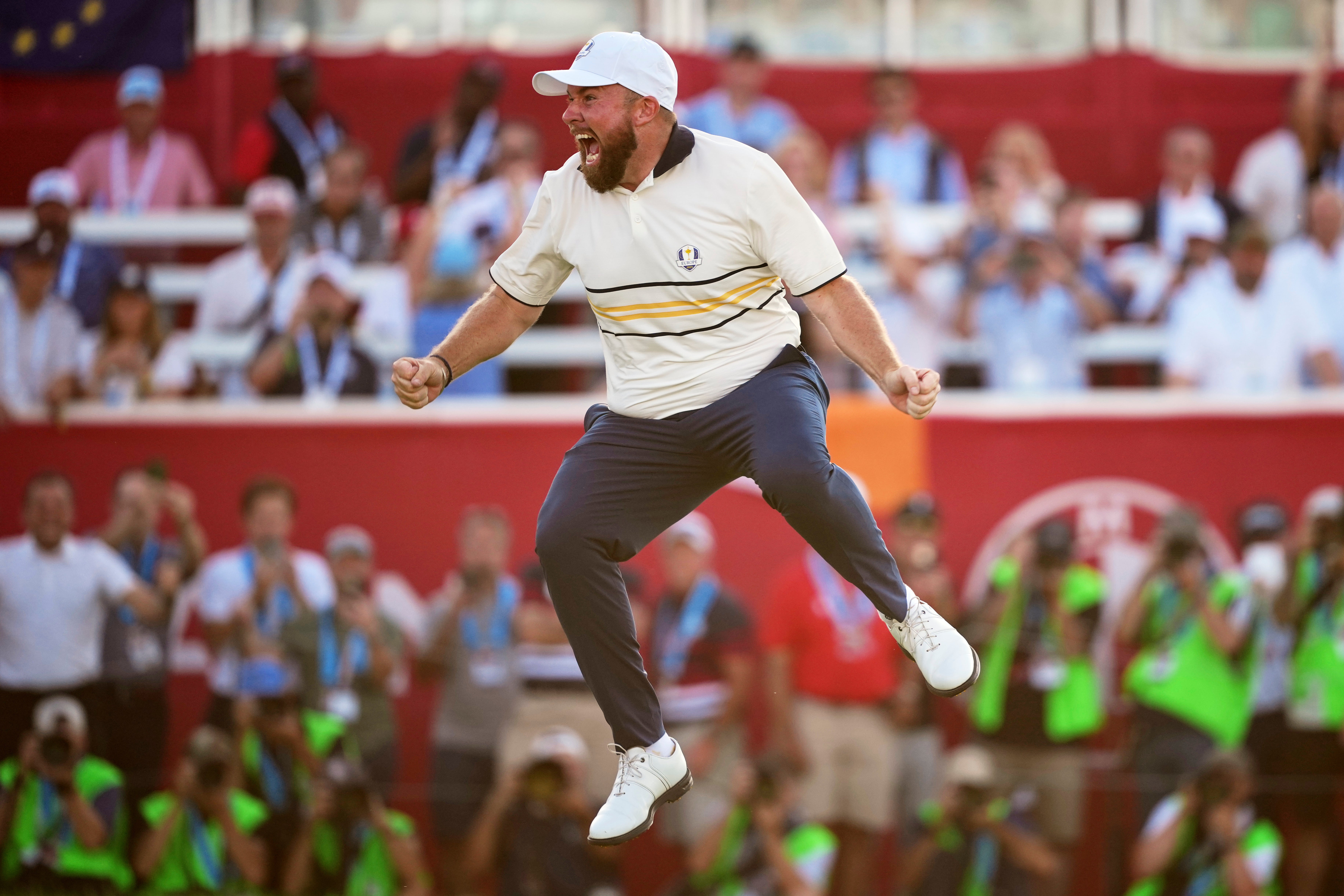 Shane Lowry leaps for joy after retaining the Ryder Cup