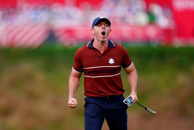 <p>Rory McIlroy celebrates holing a putt at the Ryder Cup</p>