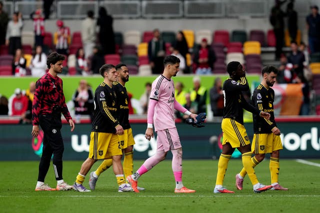 <p>Manchester United’s players leave the pitch following Saturday’s defeat at Brentford</p>