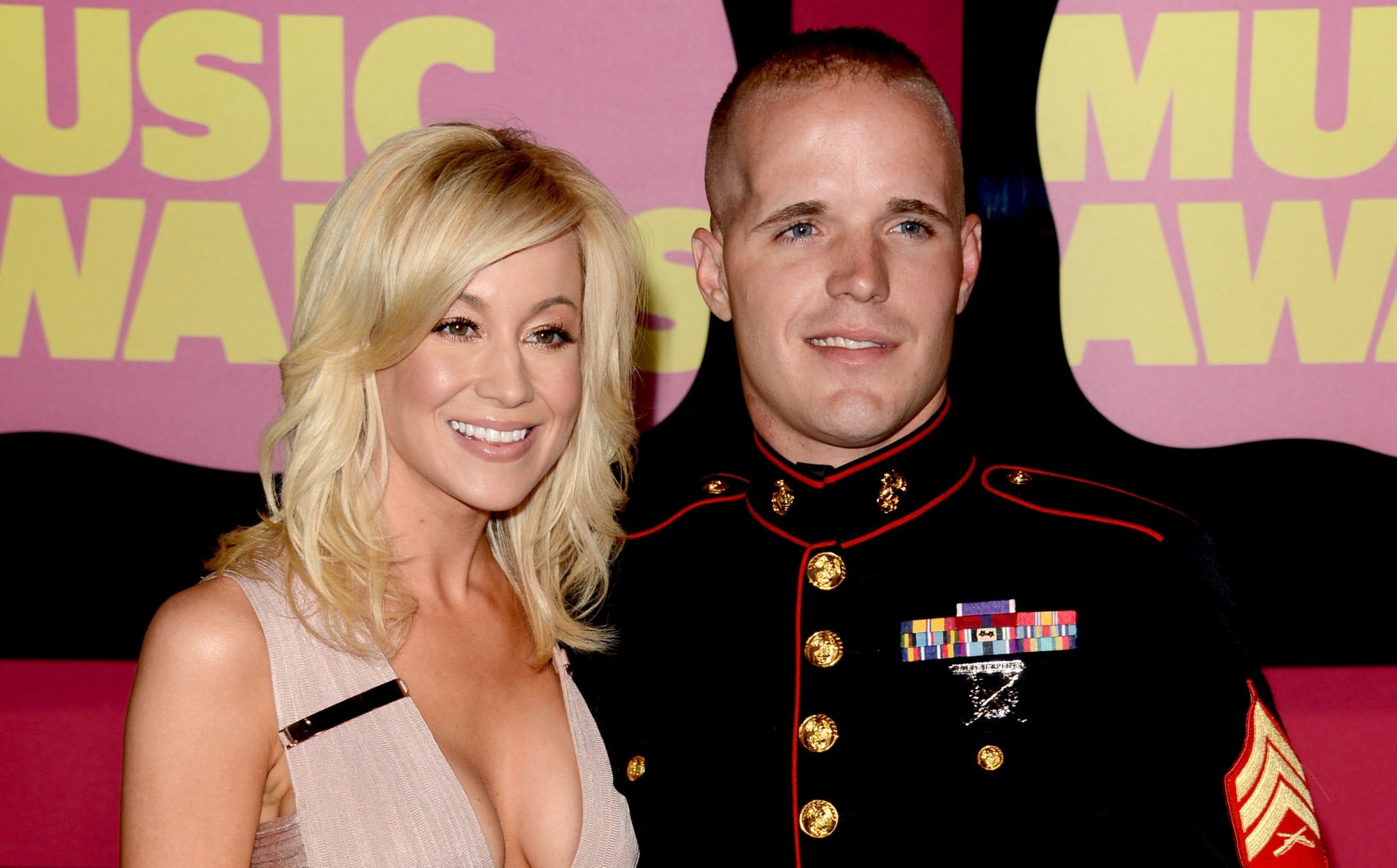 Singer Kellie Pickler (left) and Nigel Edge (formerly Sgt. Sean DeBevoise) at the 2012 CMT Music Awards