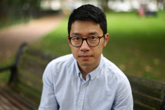 <p>Former Hong Kong legislator Nathan Law poses for a picture in London</p>