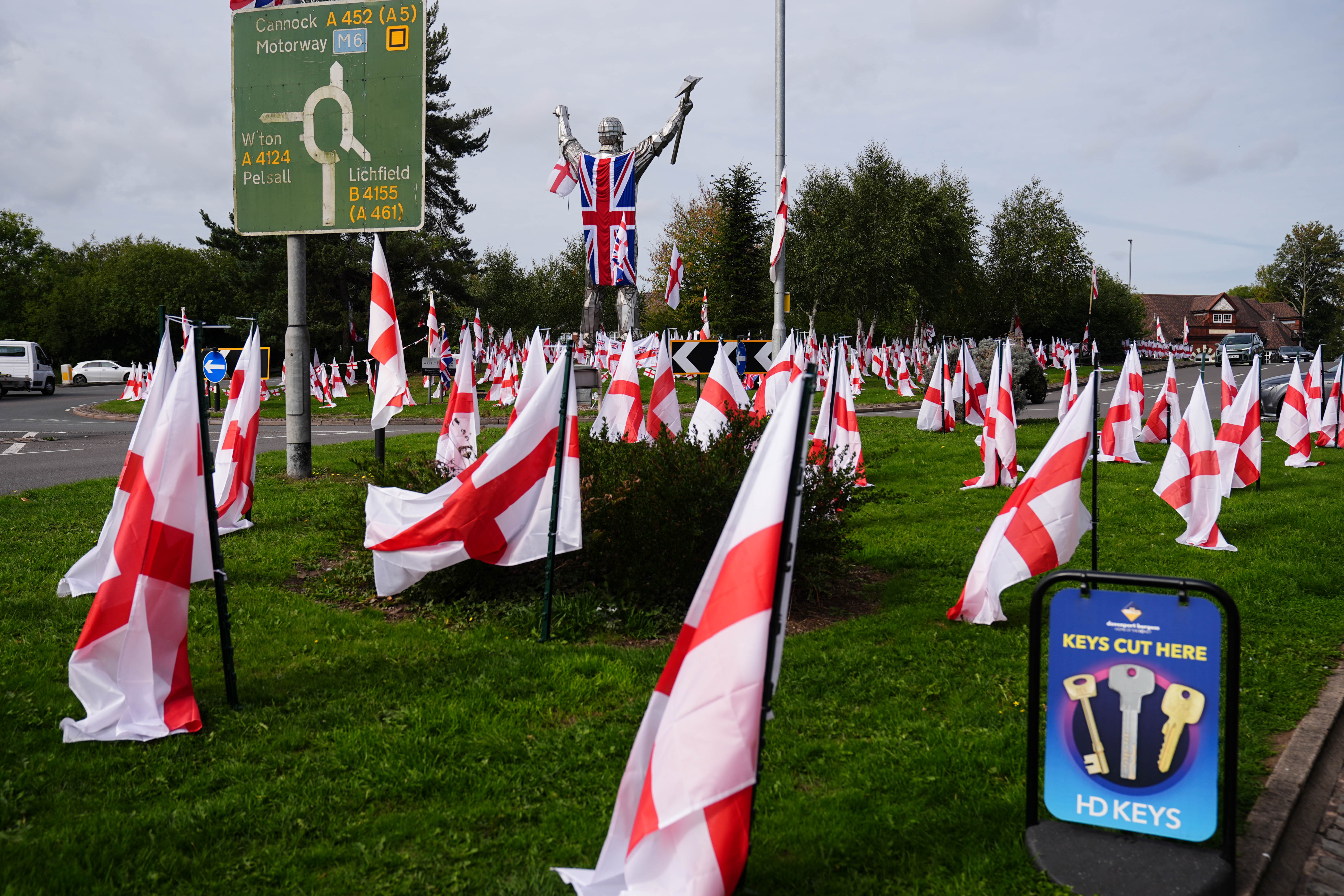 The Brownhills Miner statue, which was draped in a union flag, in Walsall, Staffordshire, in September, as part of Operation Raise the Colours