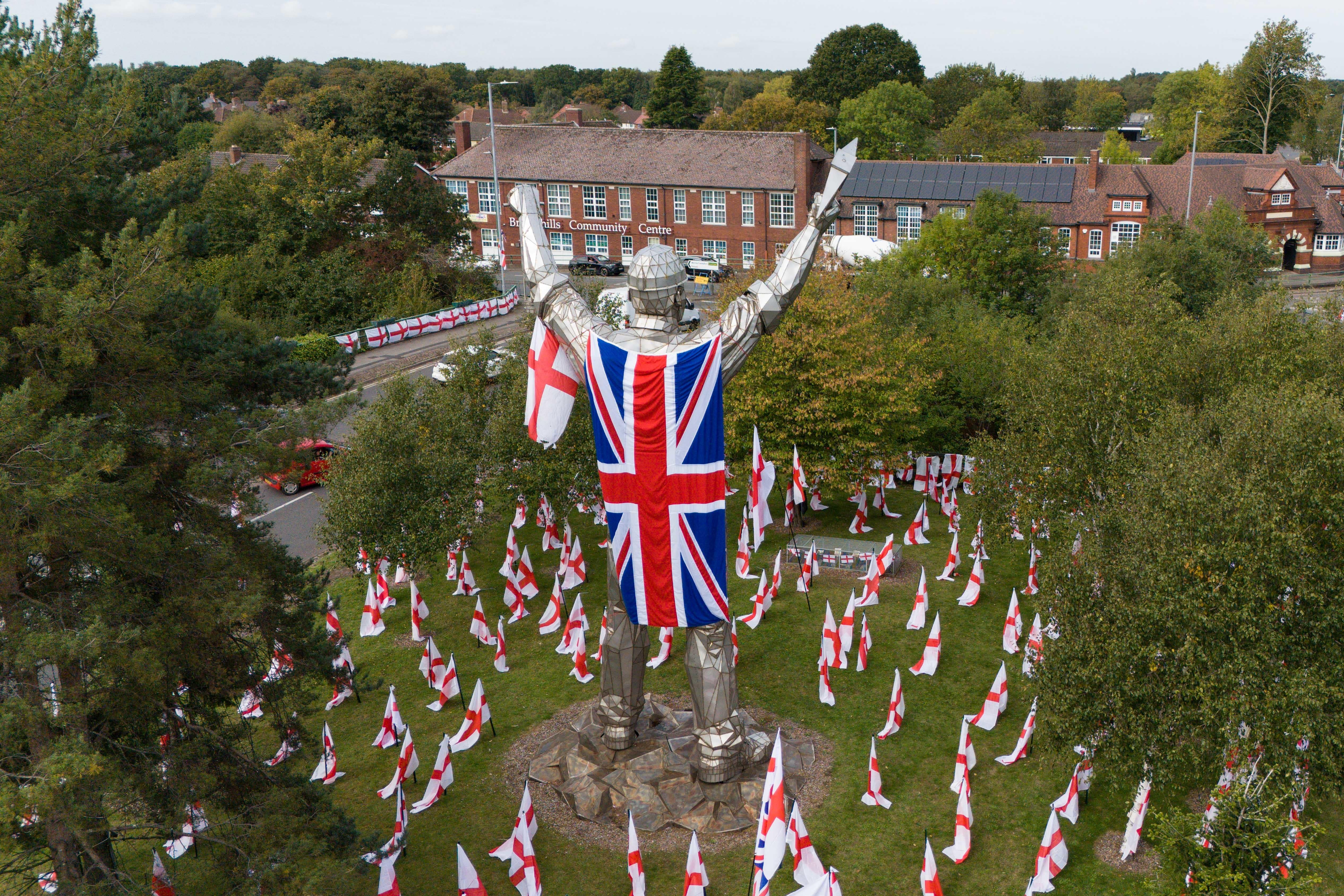 A view of the 14m-tall Brownhills Miner statue, which has been draped in a Union flag, in Walsall, Staffordshire (Jacob King/PA)
