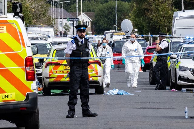Forensic officers on Hart Street in Southport (James Speakman/PA)