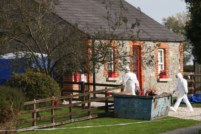 Garda forensic officers at the scene in Tallanstown, Co Louth (Peter Morrison/PA)