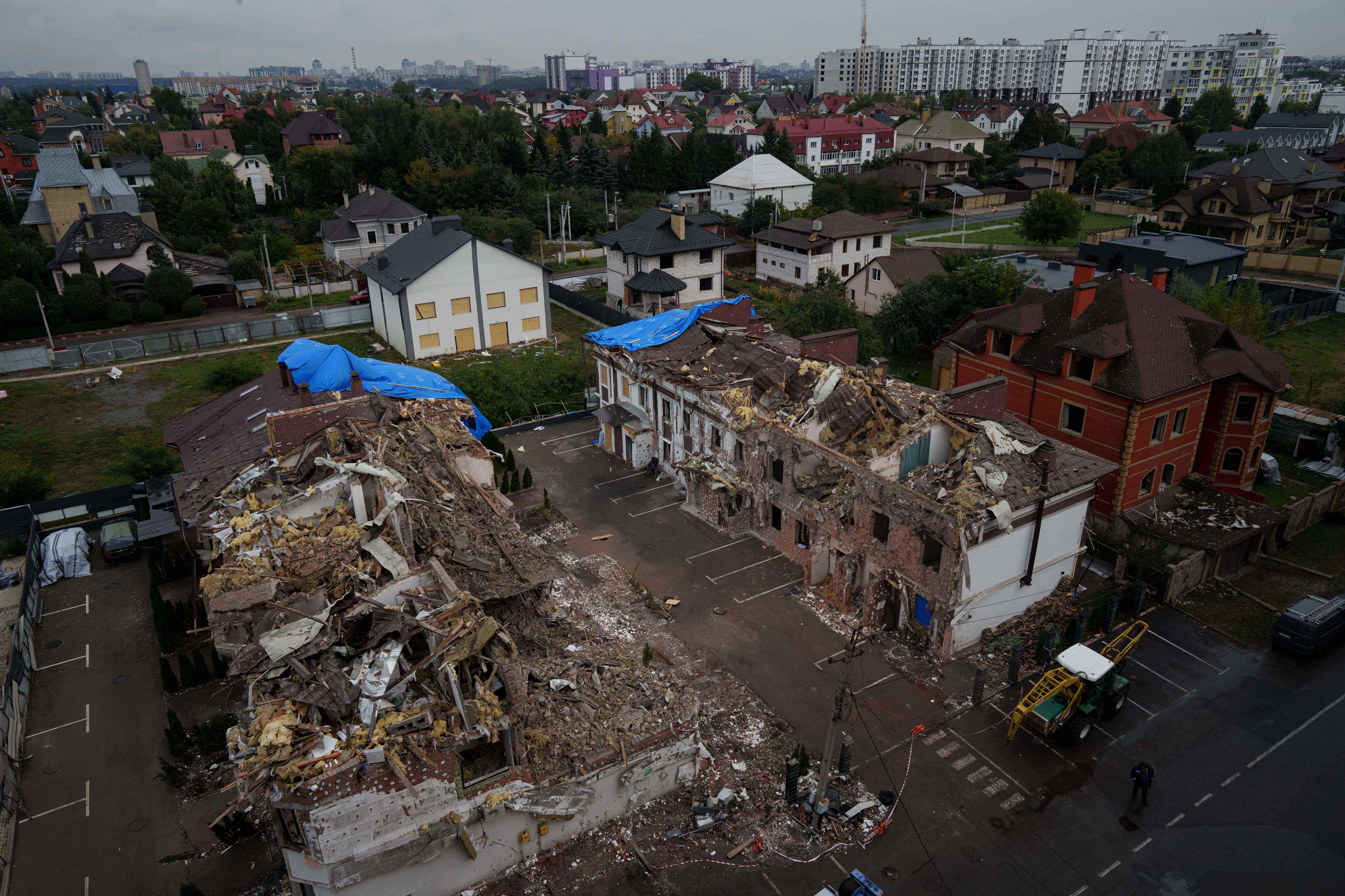 <p>Residential houses are seen destroyed after a Russian strike in Kyiv, Ukraine</p>