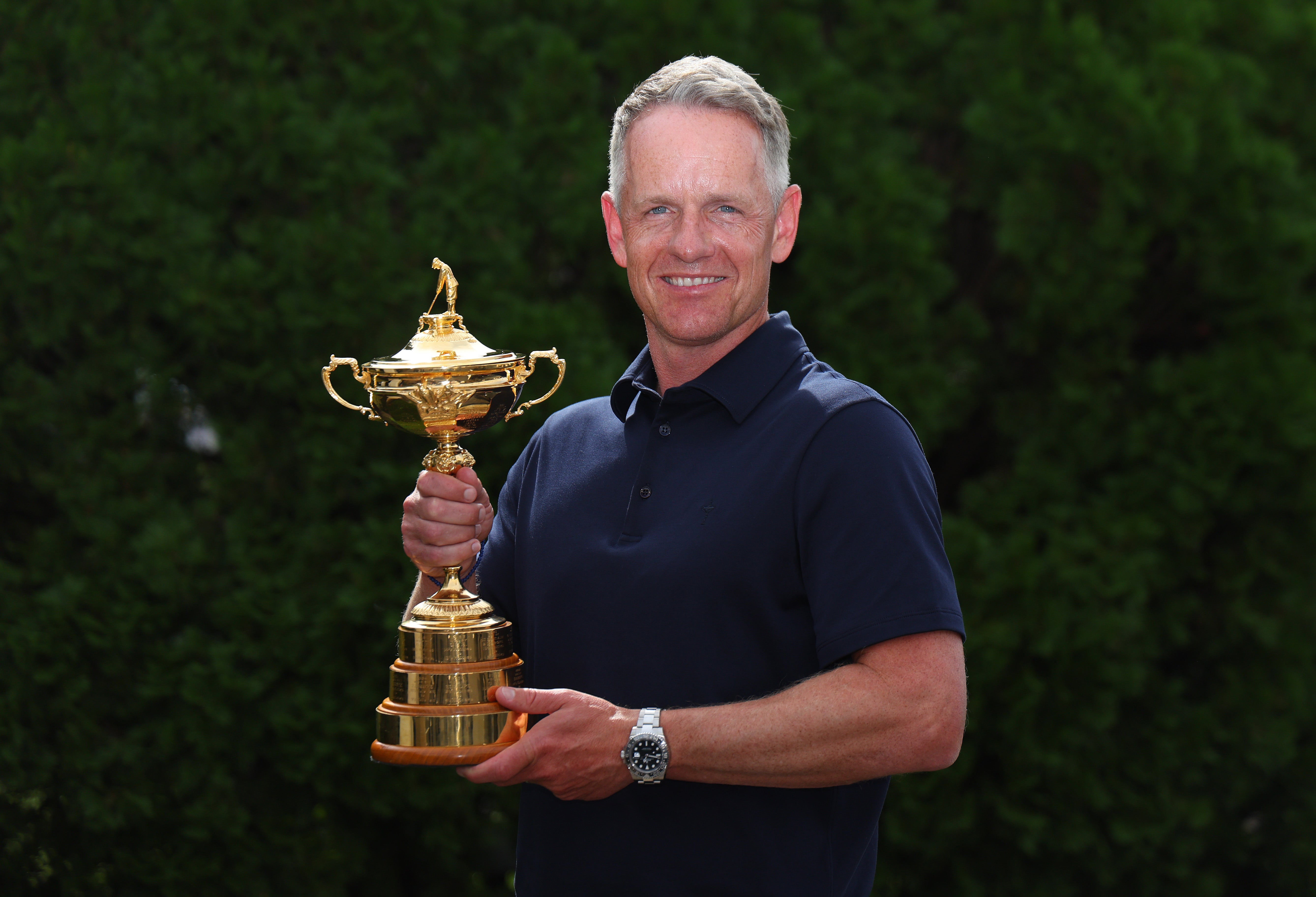 Luke Donald, European Ryder Cup captain, poses with the trophy at Garden City Hotel