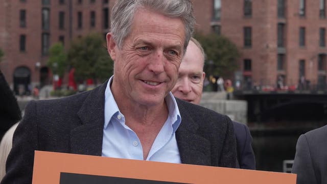 <p>Hugh Grant joins protest outside Labour Party conference in Liverpool</p>