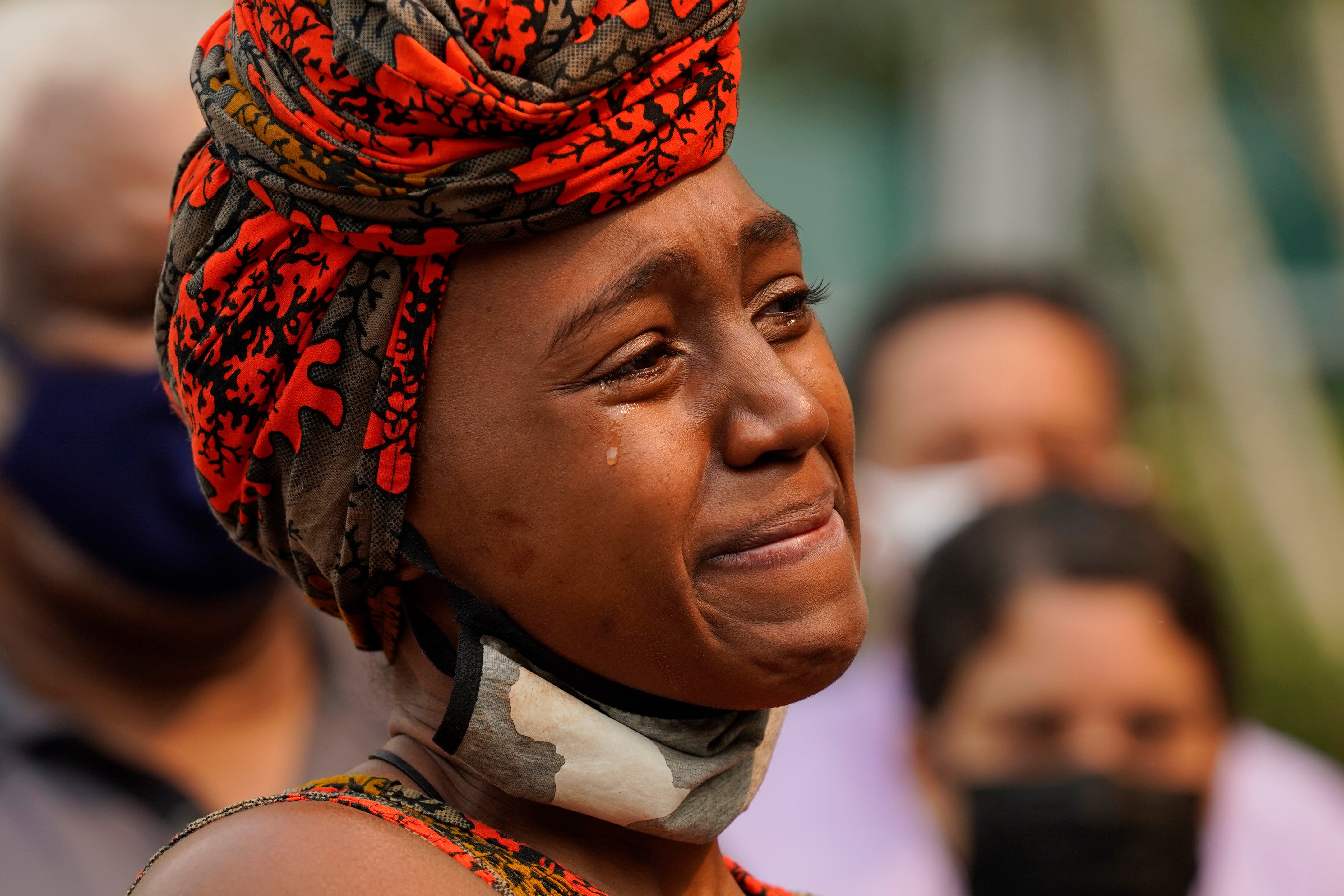 <p>A tear streams down the cheek of Nakia Porter during a news conference to announce the filing of a federal lawsuit she has brought against two Solano County Sheriff's deputies, in Sacramento</p>