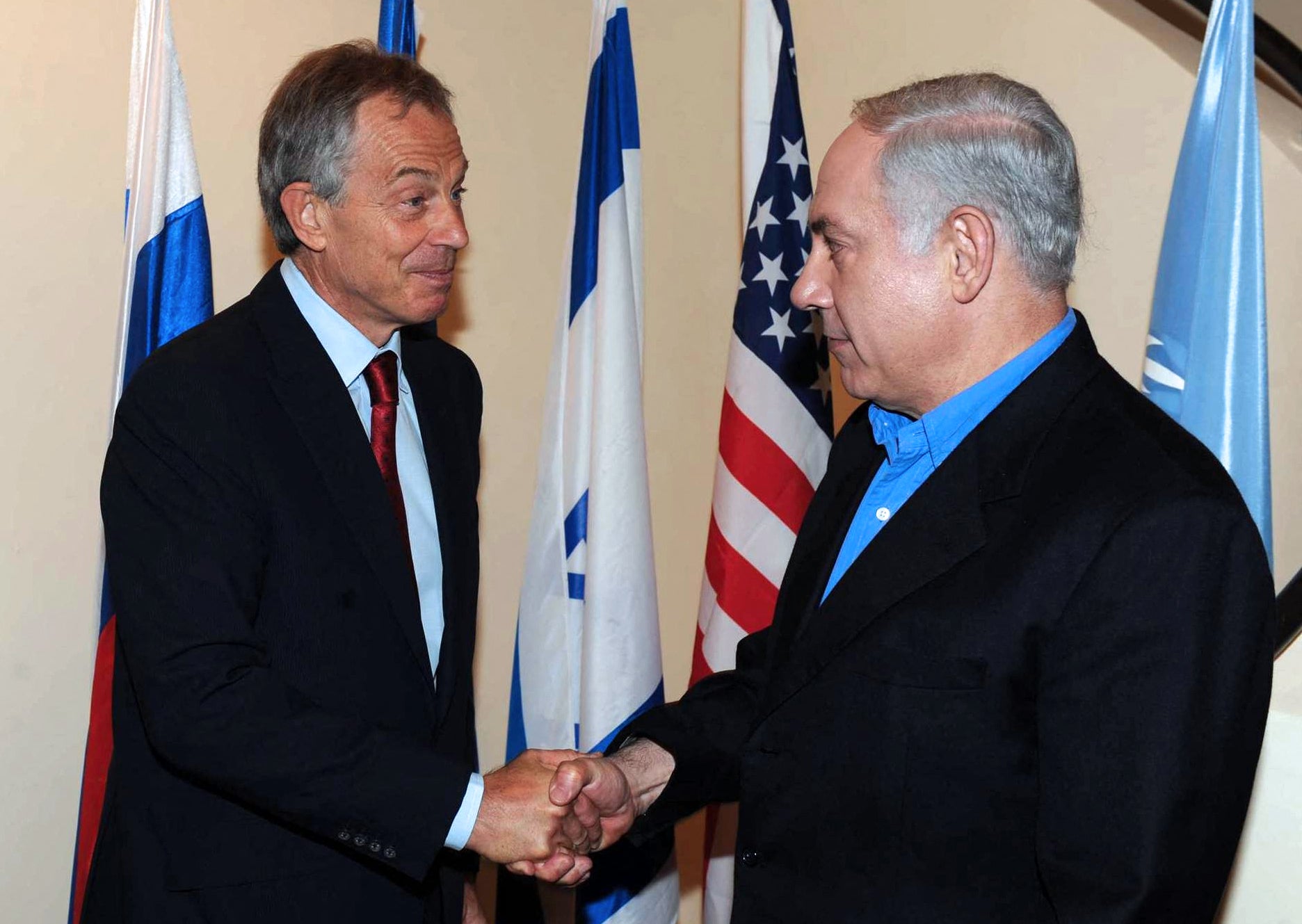 A handout picture from the Israeli Government Press Office shows Middle East Quartet Envoy Tony Blair (L) shaking hands with Israeli Prime Minister Benjamin Netanyahu on June 11, 2010 in Jerusalem.