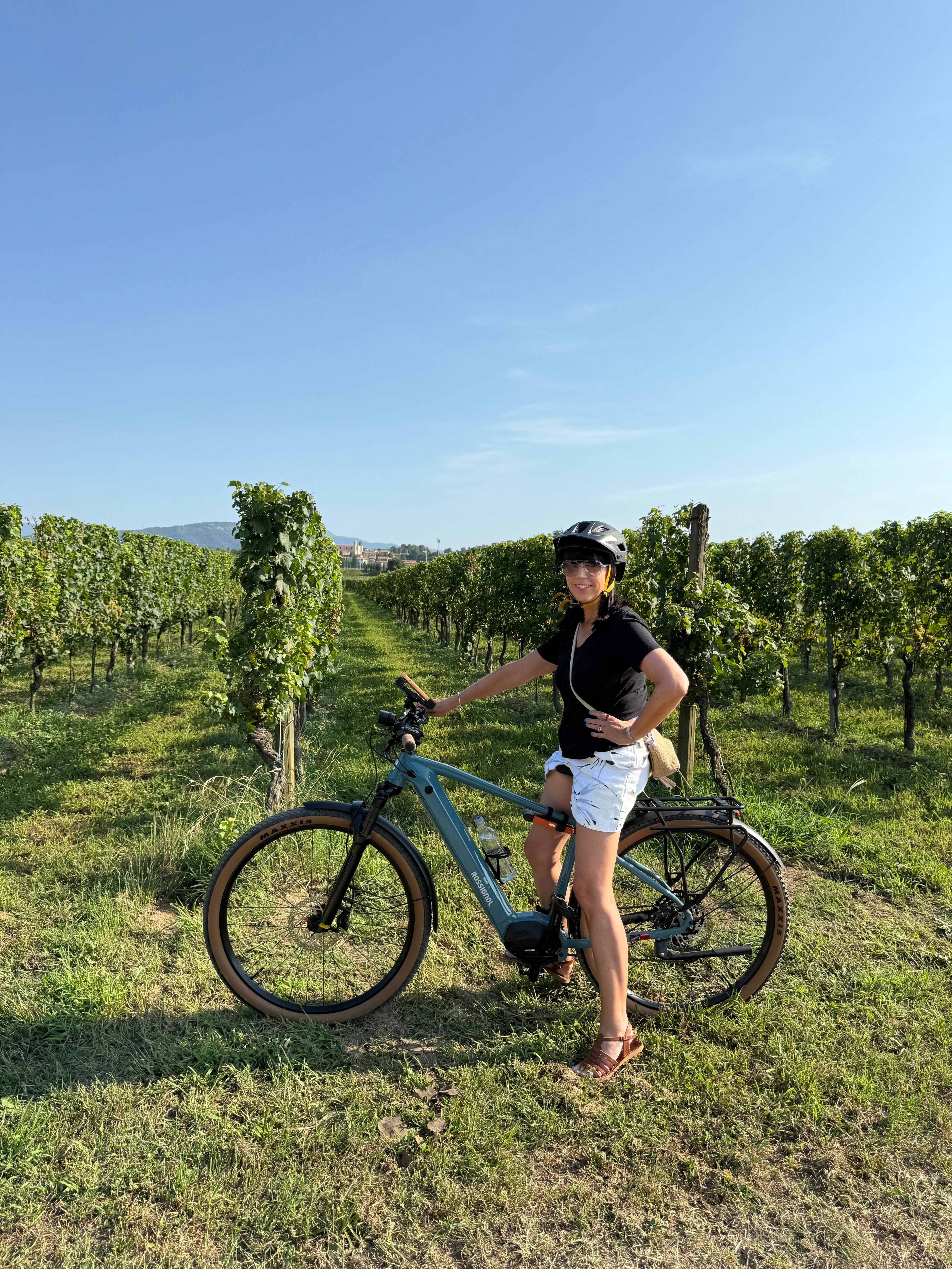 Kate explores the rolling vineyards of the Bella Vista Winery by e-bike