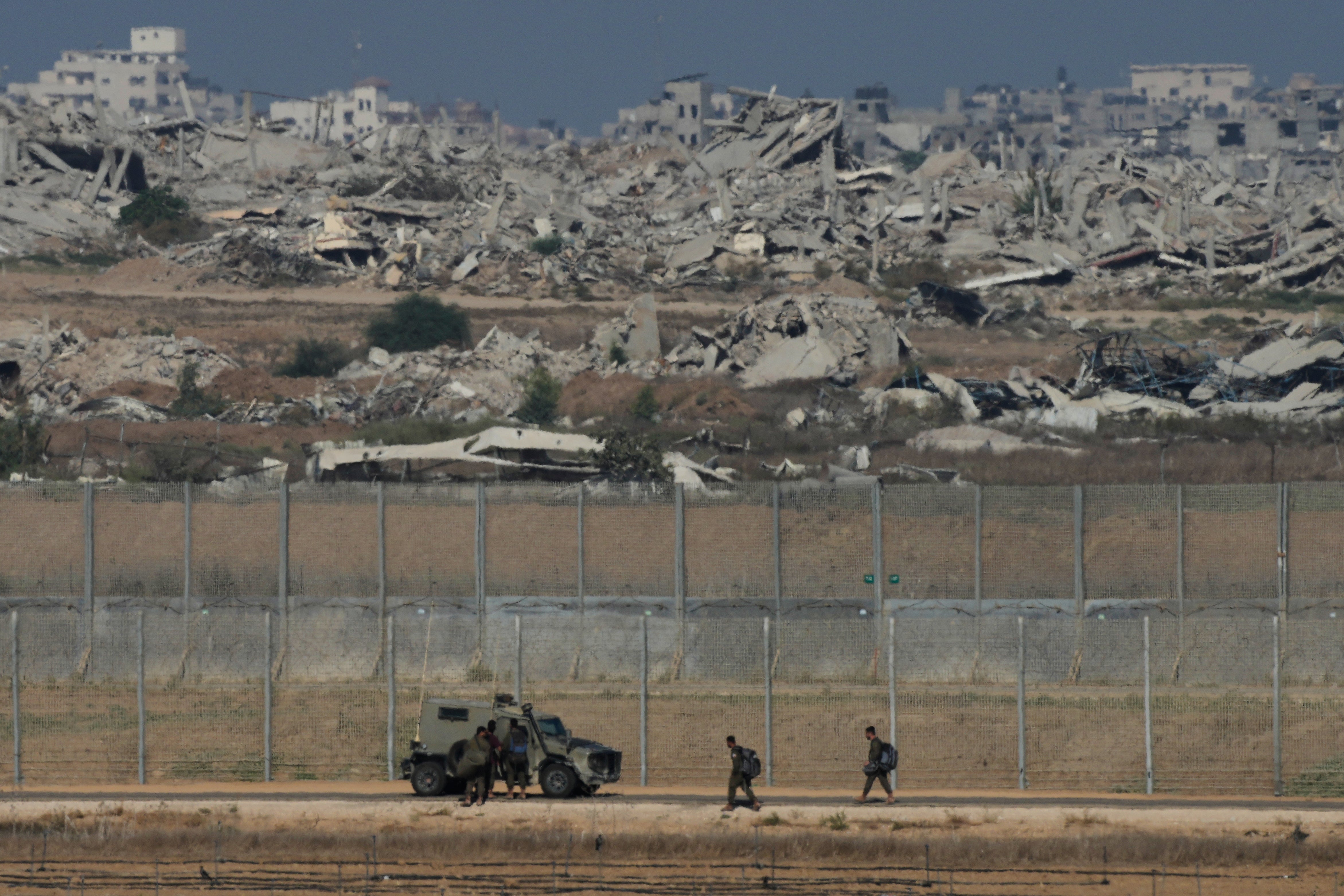 <p>Israeli troops are seen near the Gaza Strip border in southern Israel</p>