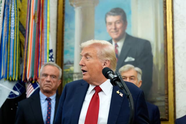 <p>President Donald Trump speaks in the Oval Office of the White House, Tuesday, Sept. 30, 2025, in Washington. Behind the President are Secretary of Health and Human Services Robert F. Kennedy, Jr., left, and Mehmet Oz, Administrator for the Centers for Medicare & Medicaid Services. (AP Photo/Alex Brandon)</p>