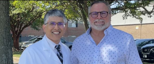 <p>Dr. Deepak Talreja (left) performed CPR for eight minutes after hearing a crash involving driver Jeff Geraci, who suffered a 'sudden cardiac death'</p>