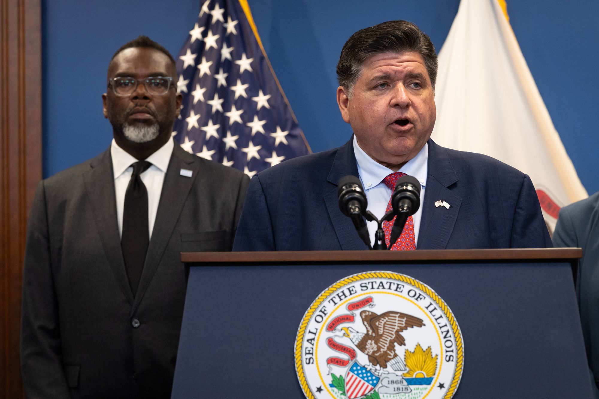 Illinois Governor JB Pritzker and Chicago Mayor Brandon Johnson have criticized the potential deployment of National Guard troops, with Pritzker saying, 'This is no way to live'