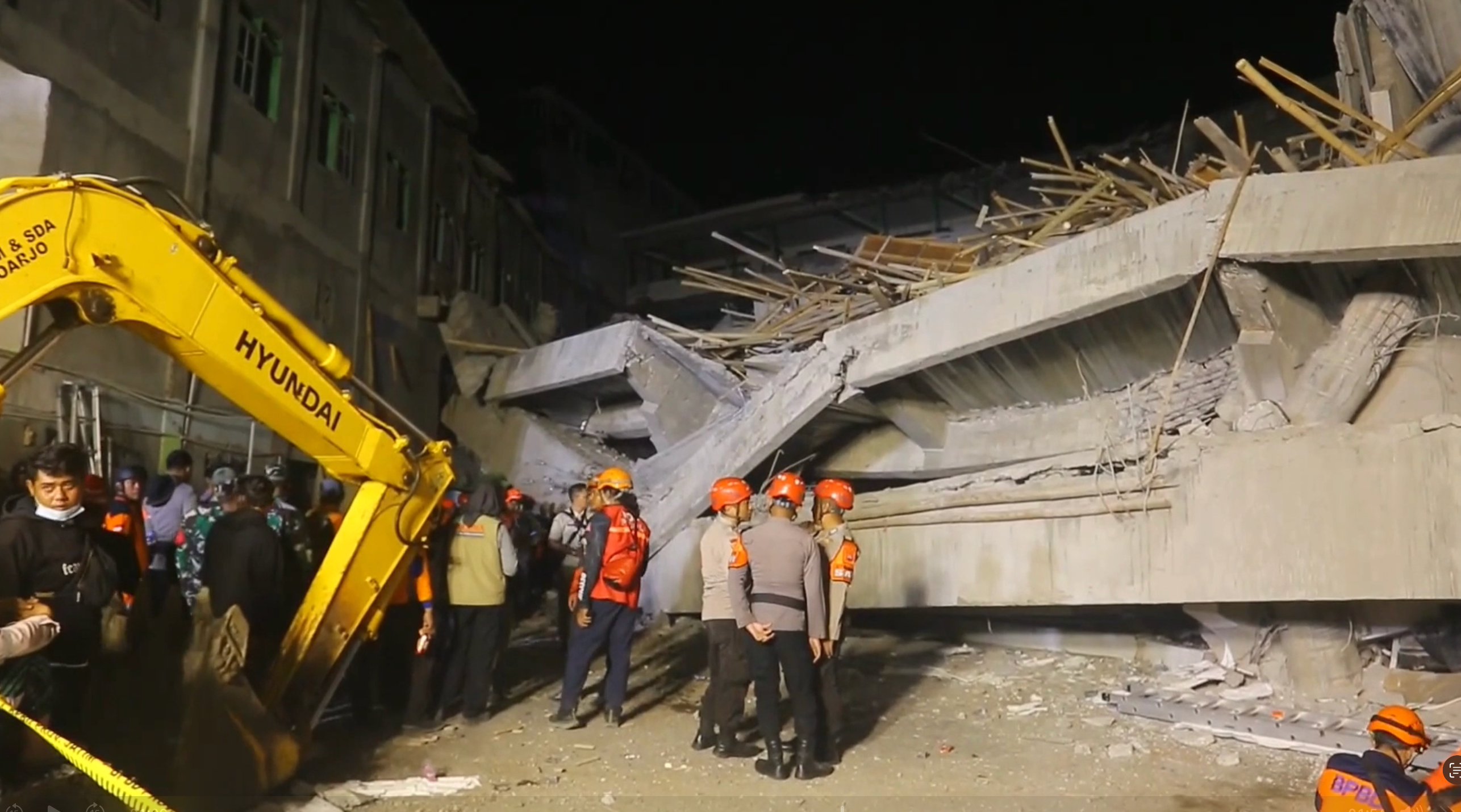 <p> Dozens trapped in deadly Indonesian school collapse as rescuers search for survivors</p>