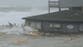 Beachfront homes collapse into the sea as hurricanes batter US coast