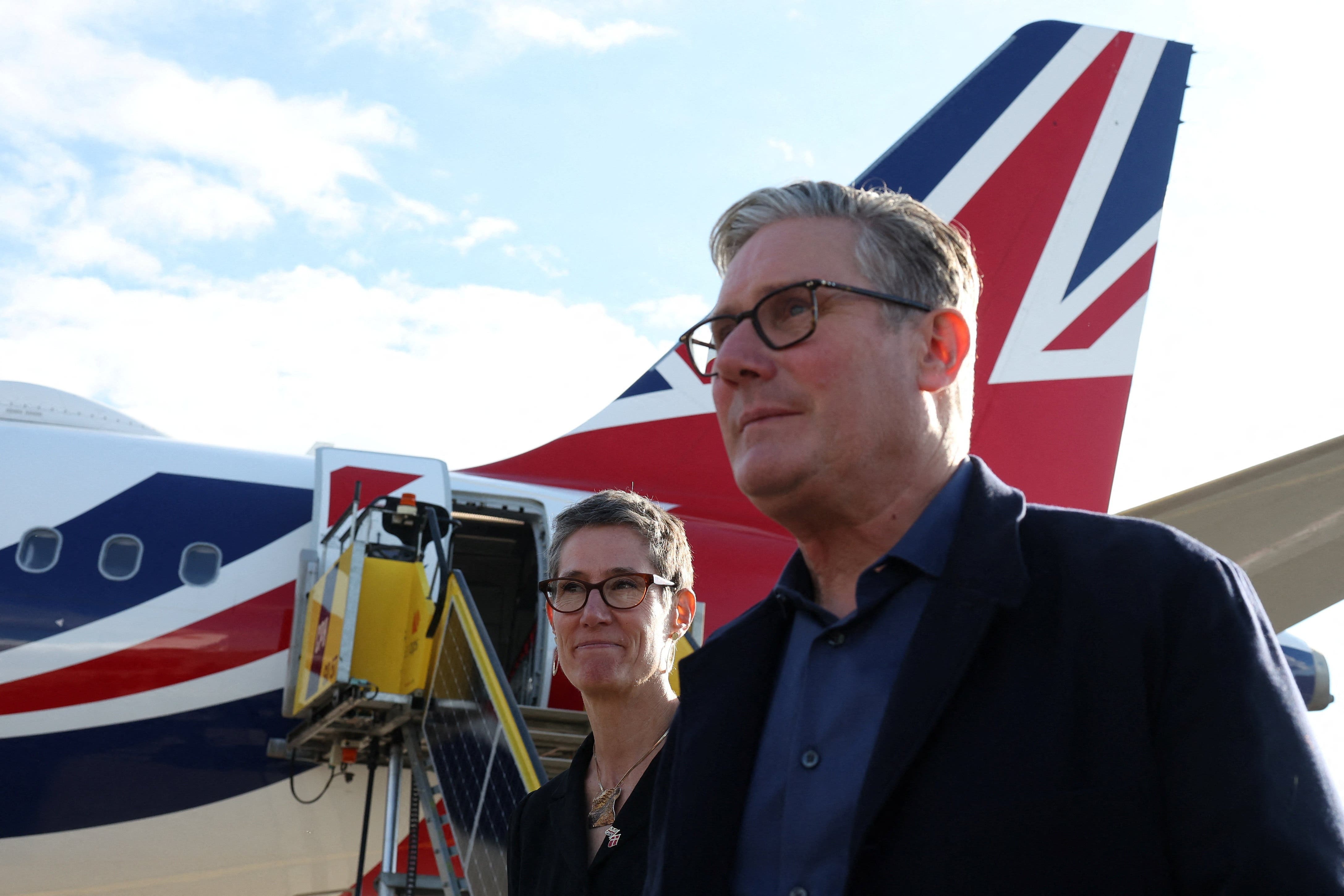 Sir Keir Starmer is met by British ambassador to Denmark Joelle Jenny in Copenhagen (Suzanne Plunkett/PA)