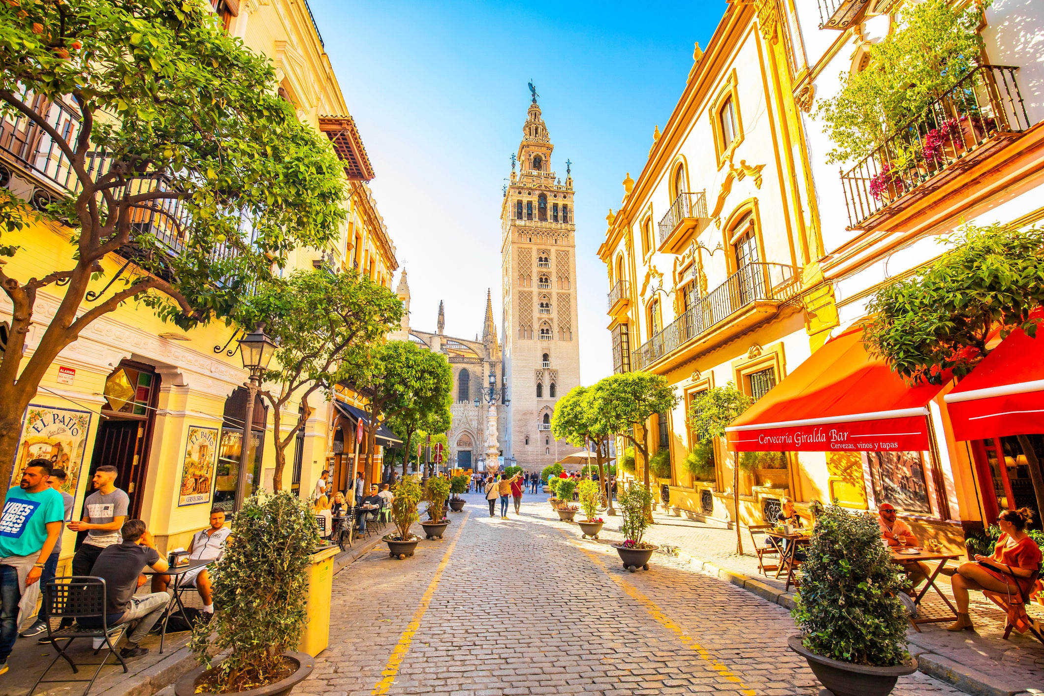 Seville is one of Spain's most beautiful and walkable cities. Above is the 300-foot-tall Giralda bell tower