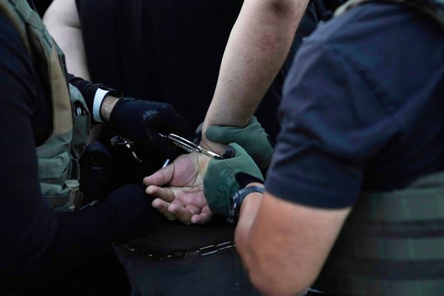 <p>ICE agents make an arrest in Park Ridge, Illinois, on September 19, 2025</p>