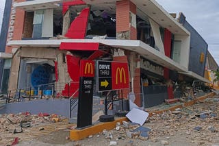A damaged McDonald's store is seen in Bogo City, Cebu province, Philippine