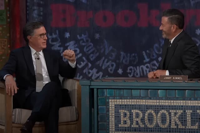 <p>Late-night hosts Stephen Colbert (left) and Jimmy Kimmel (right) appeared on each other’s shows Tuesday night as LA-based Kimmel films in New York City for the week</p>