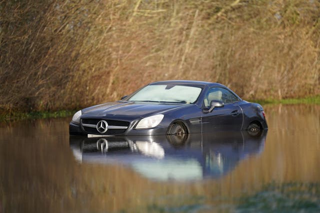 Fire brigade rescues from vehicles caught in floods in England have doubled since before the coronavirus pandemic, according to new research (Joe Giddens/PA)