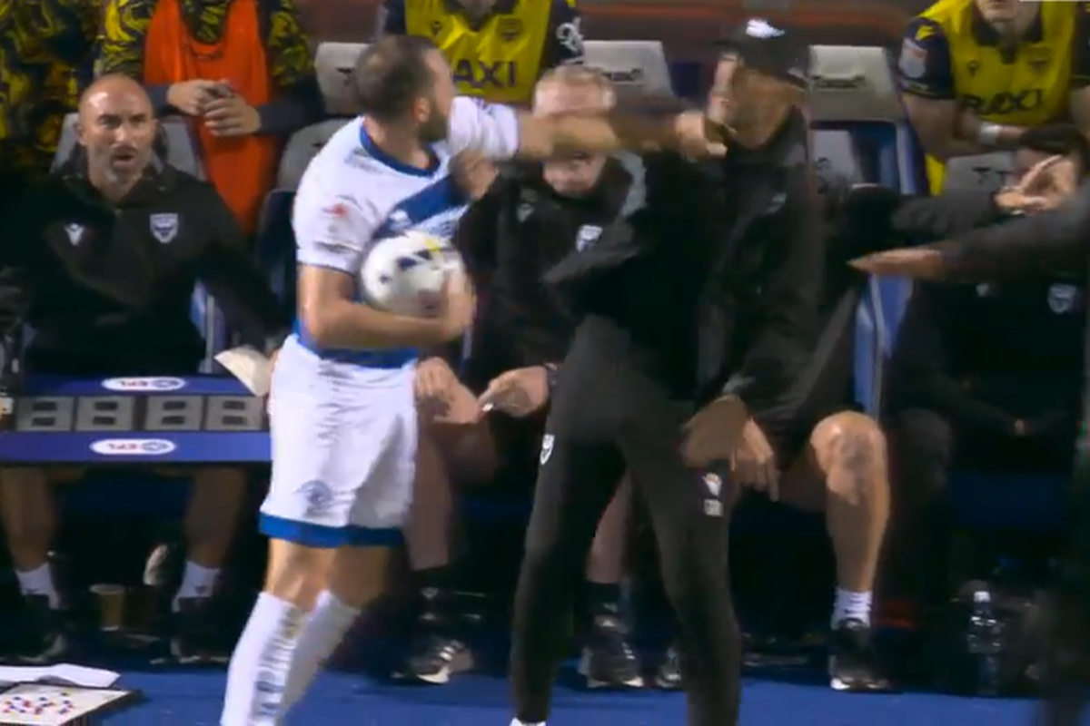 Championship game descends into chaos as Oxford manager and QPR player brawl Championship game descends into chaos as Oxford manager and QPR player brawl