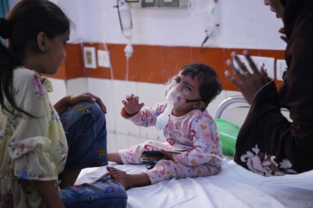<p>File. A child reacts during treatment in hospital</p>