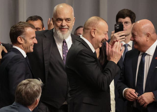 <p>France's President Emmanuel Macron, Albania's Prime Minister Edi Rama, Azerbaijan's President Ilham Aliyev and Austria's Chancellor Christian Stocker share a laugh during a working session of the 7th European Political Community (EPC) Summit at the Bella Center in Copenhagen on October 2, 2025</p>