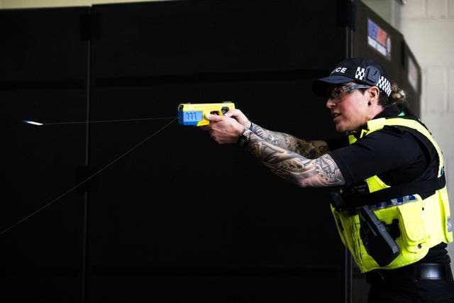 <p>An officer discharges a probe during a demonstration of the Taser 10</p>