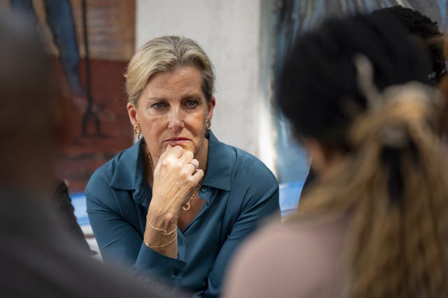 The Duchess of Edinburgh talks with people at the Makala Prison Safe House in Kinshasa, Democratic Republic of Congo (Aaron Chown/PA)