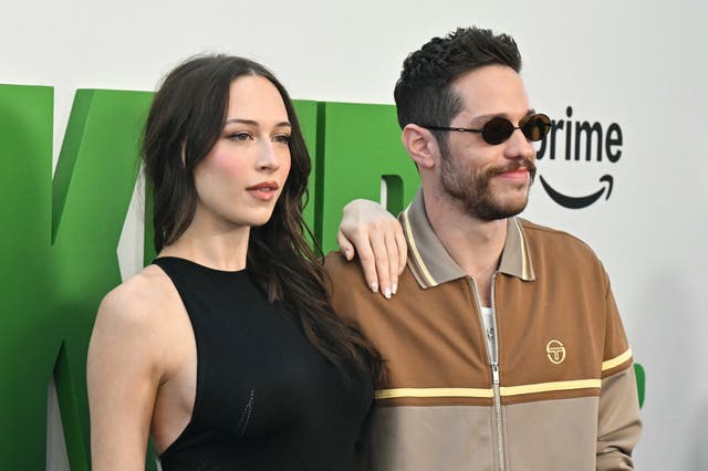 <p>US actor Pete Davidson (R) and girlfriend Elsie Hewitt attend the world premiere of "The Pickup" at the Regal LA Live in Los Angeles on July 27, 2025</p>